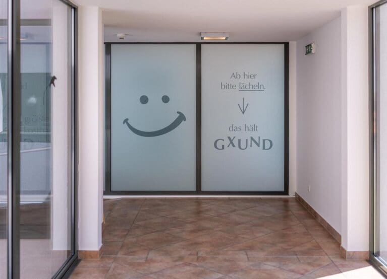 Ab hier bitte lächeln, das hält GXUND - das GXUND in Bad Hofgastein